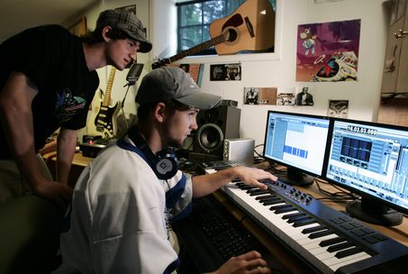 ex0725montLNS "Rockin' the Suburbs," a music festival this Saturday at Montclair High School, was organized by Dillon Rand, left, and Connor Smith to raise money for the construction of a music recording studio at the school. The headliner is the Sugar Hill Gang, which recorded the hit "Rapper's Delight" in 1979. Rand and Smith work on a song in Smith's basement studio. Friday, July 24, 2009. Photo by David Gard/ New Jersey Local News Service. Sent DIRECT TO SELECTS Friday, July 24, 2009 17:04:13 2400 1613